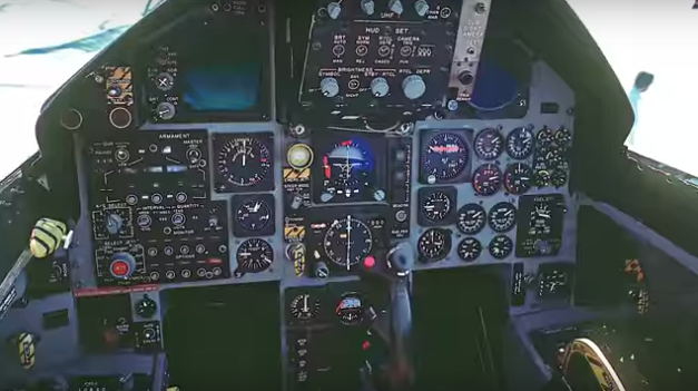 cockpit of a airplane with lots of flight instruments